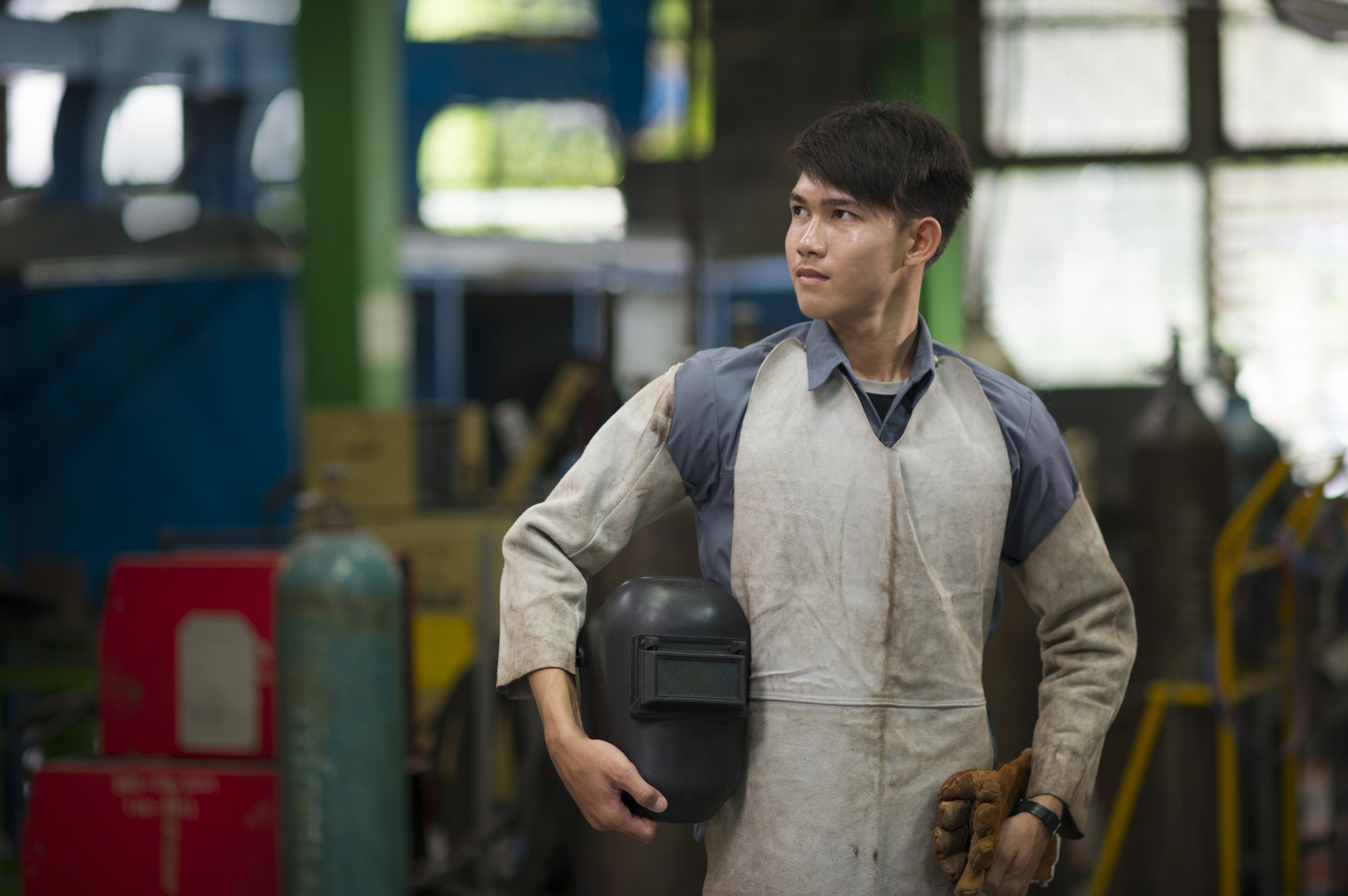 Man wearing safety suite for working in steel industry